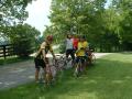 Alan Darby, Don Feeney, Dave Bennett, and Tim Chilton wait at the top of the hill for the rest of the riders to regroup after aborting the river ford on Rice Road.